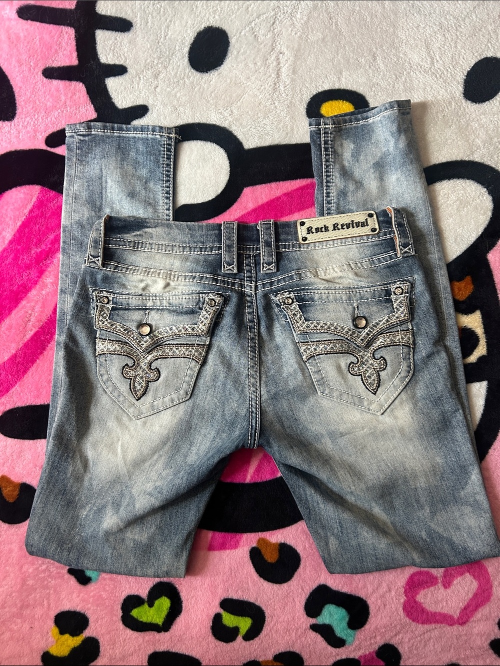 Rock Revival Light Blue Denim Jeans with Embellished Pockets